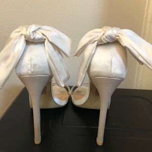 White heels with bow- bridal